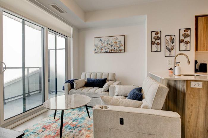 Modern High-Rise Condo w City Views & Balcony