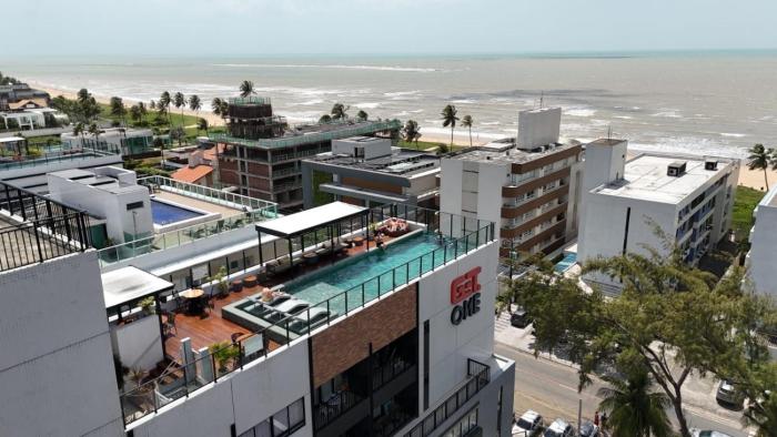 Flats a poucos metros do mar - Get One