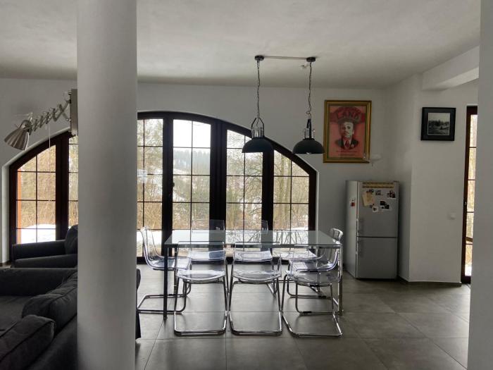 Modern mountain home with a view of nature