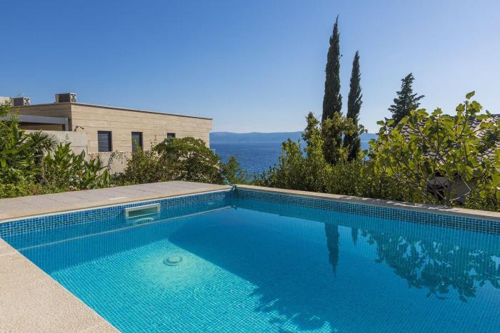 Traumhaftes Apartnent nur 80 Meter zum Strand mit Pool und Meerblick