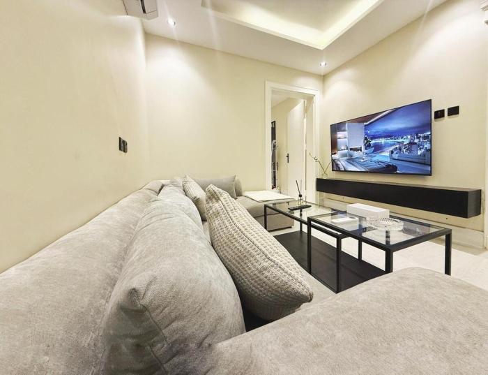 شقة غرفة نوم وصالة بتصميم هادئ