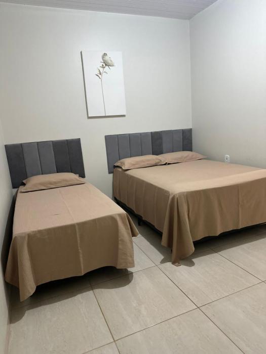 Quarto com ar banheiro frigobar