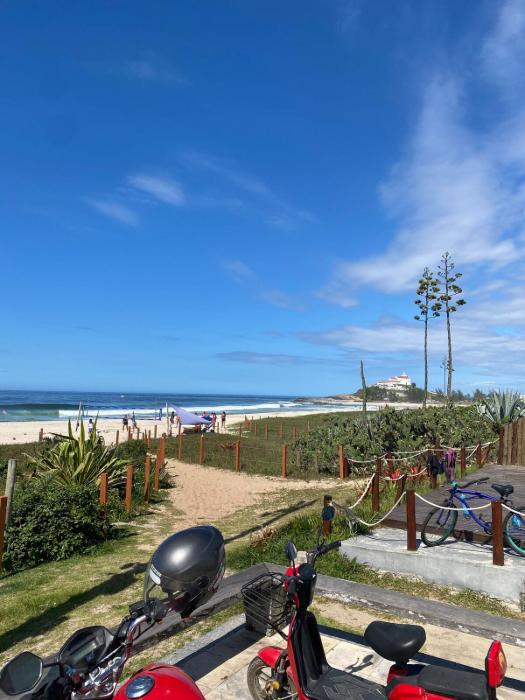 7 Apartmento em Itaúna 50m da praia com estacionamento Ducha