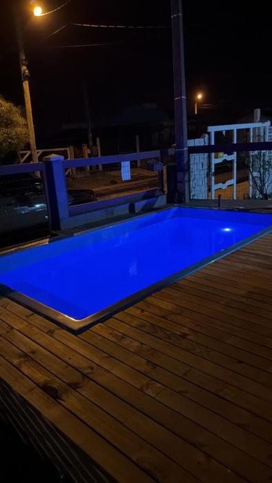 Casa com piscina em Capão da canoa