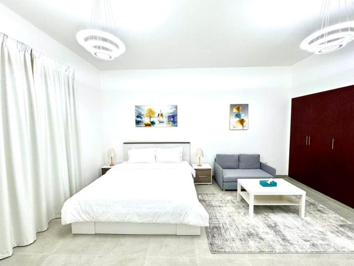 England Cluster International City - Bright,Spacious and Well Furnished Studio