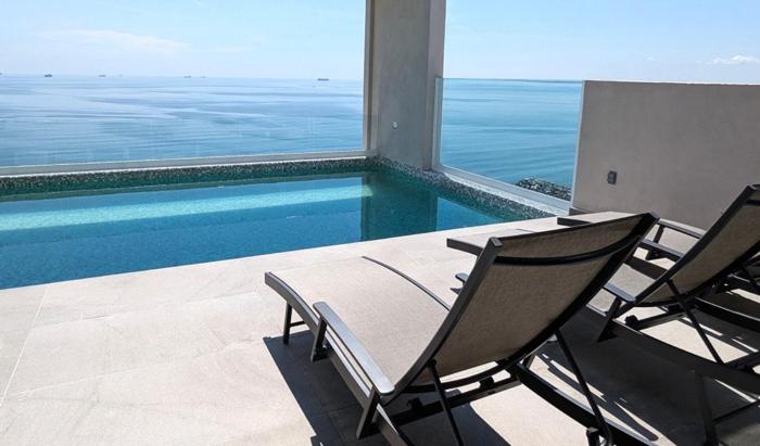DEPTO PALMAS VIP Depa frente al mar con alberca y estacionamiento Roof vip