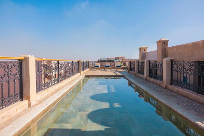 Sublime appartement 2 chambres en plein centre entre Gueliz et hivernage avec piscine