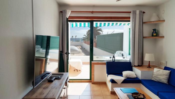 Lanzarote Beachfront Apartment on Las Cucharas Beach with a sea view