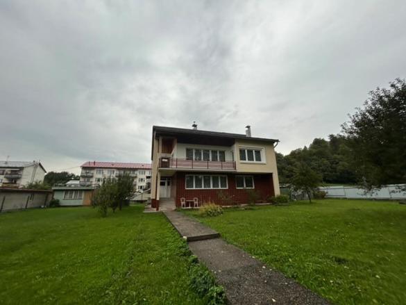 House with mountain views and garden by the stream