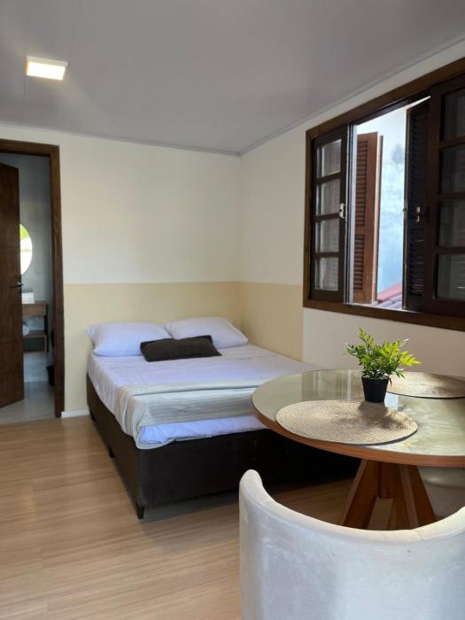 Studio funcional a poucos metros da praia