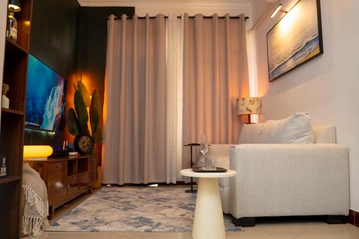 The Modern Nest Stylish 1BR MbeziBeach with Fast WiFi, Work Desk & Smart Home