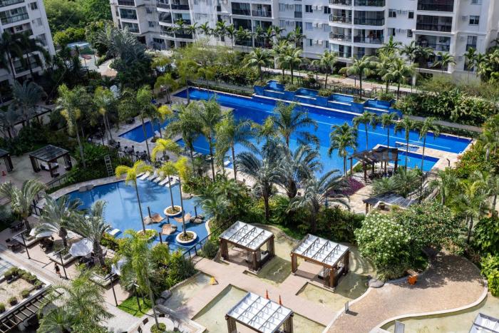 Barra Apartamento 2 quartos com vista piscina em Condomínio Estilo Resort perto do Rock in Rio, Cozinha completa, Portaria 24 horas, Estacionamento privativo, ideal para família com crianças, casais e viagens a trabalho