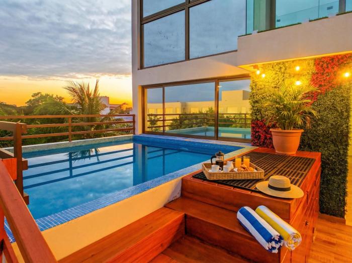 One Bedroom Apartment with Pool Gym Fast WiFi and Air Conditioning Near the Beach 303