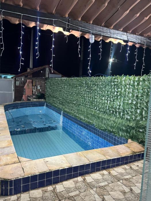 Casa com piscina aquecida