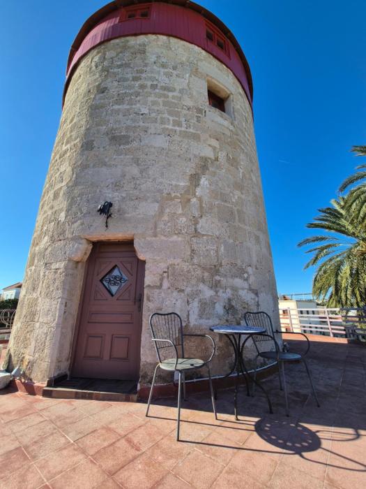 A medieval windmill tower in the heart of old town with magnificent view