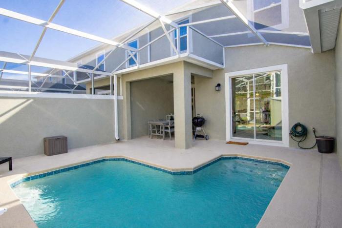 Stunning 4BR at ChampionsGate - Pool & BBQ