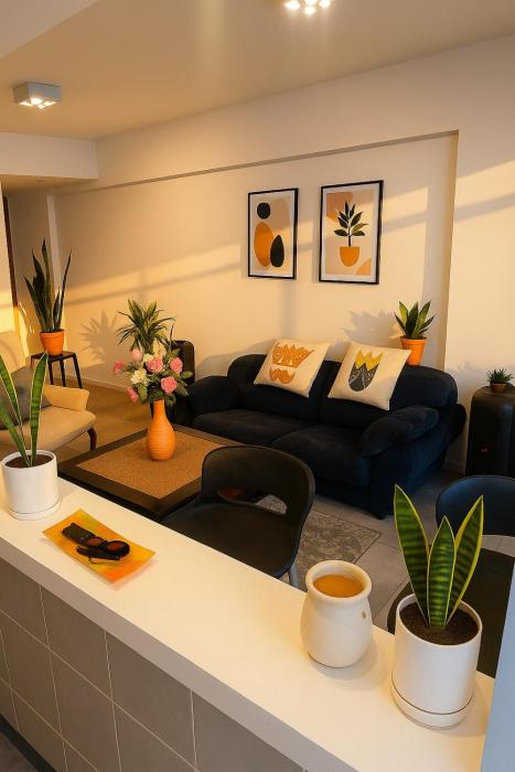 Departamento con living, dormitorio, parrilla y cochera