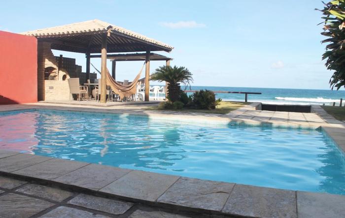 Casa pé na areia 4 suites, 1,36 km do centrinho