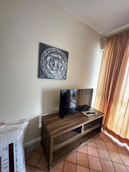 C112 Apartamento de 1 quarto pé na areia com vista lateral ao mar em Canasvieiras
