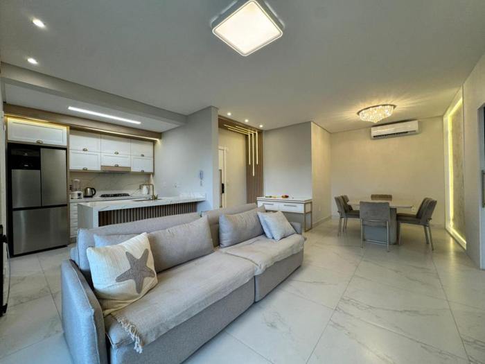 Invictus Residence 202 - Apartamento Frente Rua Decorado na Praia de Palmas a 4 Minutinhos do Mar