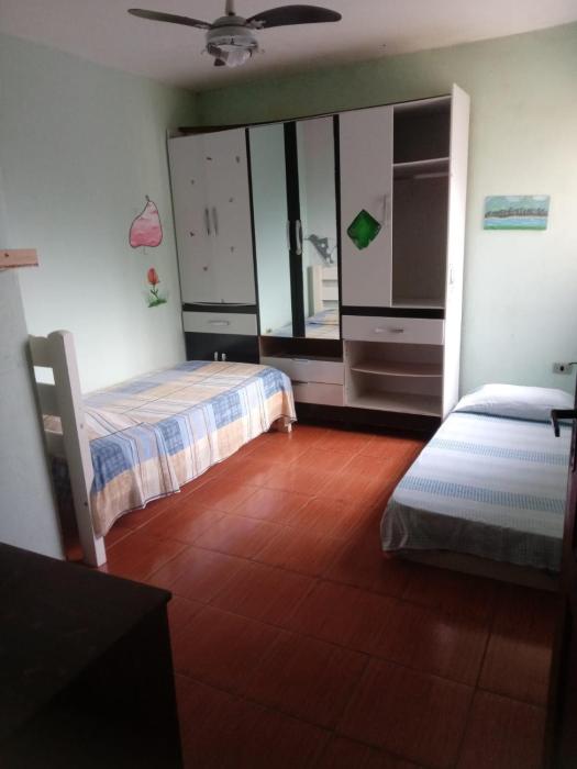 Casa Confortável Com Garagem e Vista em caraguá