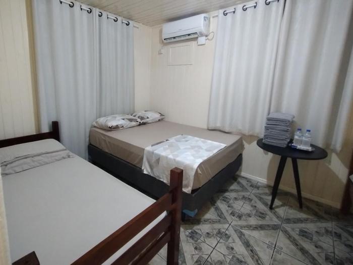 Chalé com garagem fechada