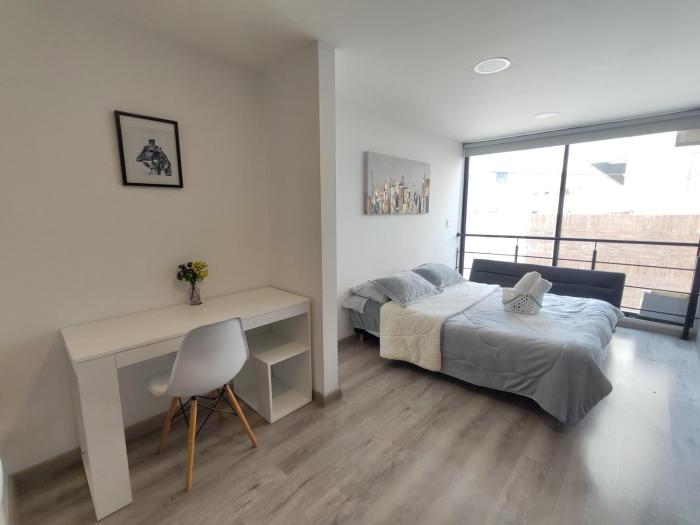 Apartamento moderno frente a la Universidad Santo Tomás WiFi y parqueadero