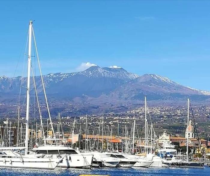 Magic Etna and glamorous blue sea