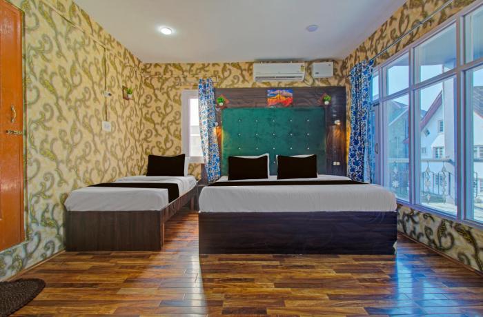 Collection O Kursoo Rajbagh Formerly Mid Valley Residency