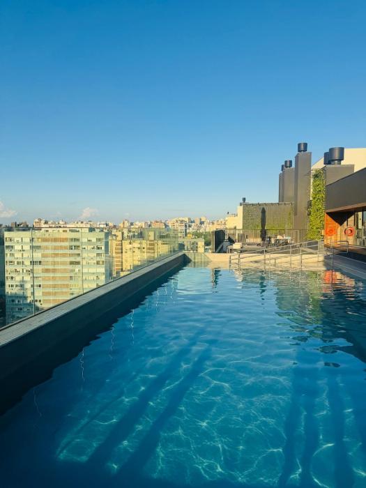 Rooftop com piscina alêm de por do sol incrível POA, Cidade Baixa, Centro