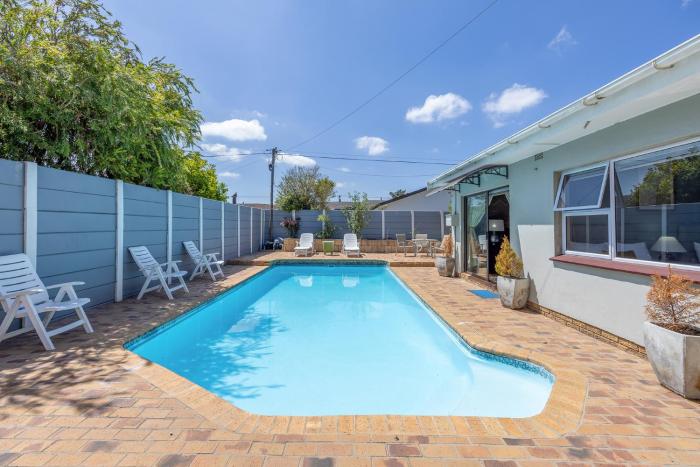 Spacious 4BR Home for 12 with a Private Pool and dedicated Braai BBQ Area