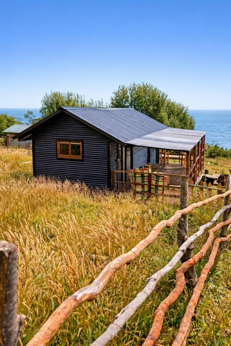 Cabaña con vista al mar