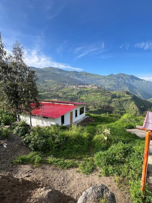 House with a panoramic view of the city and mountains