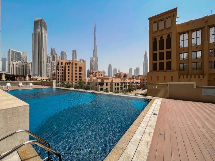 Vogue Vacation Homes, Downtown Bellevue Towers near Burj Khalifa and Dubai Mall, One bedroom Apartment with Balcony and City view, Access toAmenities