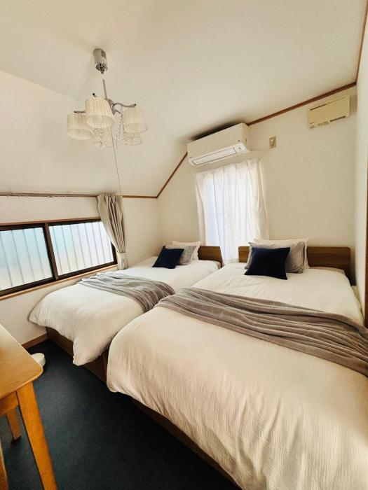 ゲストハウス陽だまりのうたたねこ 月と太陽