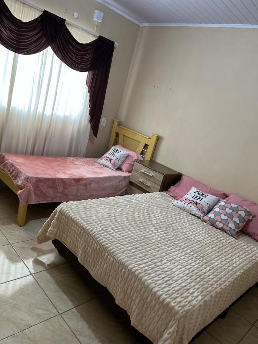 Casa aconchegante 2 quartos e ótima localização para o verão!