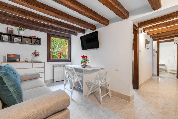 Rifugio veneziano con travi a vista a Dorsoduro