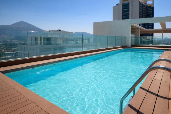 Departamento con vista mas piscina y estacionamiento al lado Parque Arauco