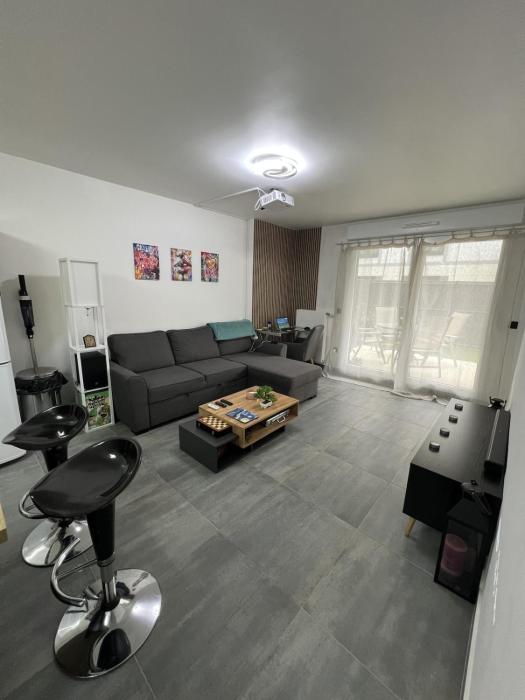 Appartement moderne avec jardin privatif