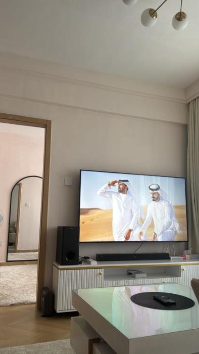 Cozy 1BR Luxury Suites near the Airport with pool, gym & city views