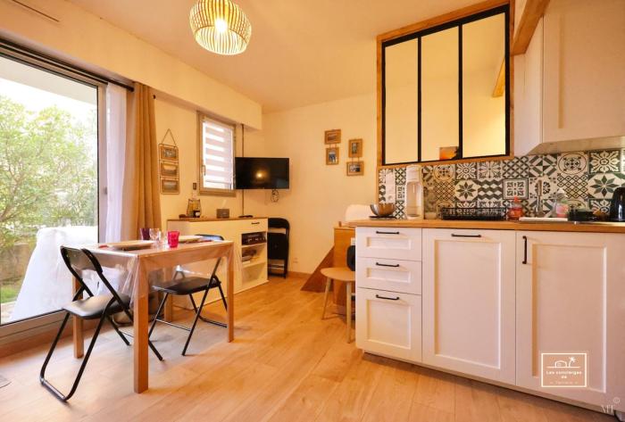 Le héron, plage à pieds