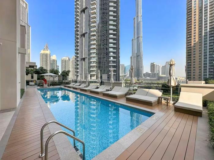 Vogue Vacation Homes, 2 Downtown Act One near Burj Khalifa and Dubai Mall, Two Bedroom Apartment with Balcony and City Skyline View, Access toAmenities