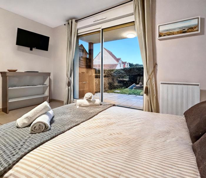 Studio lumineux avec jardin et parking privé