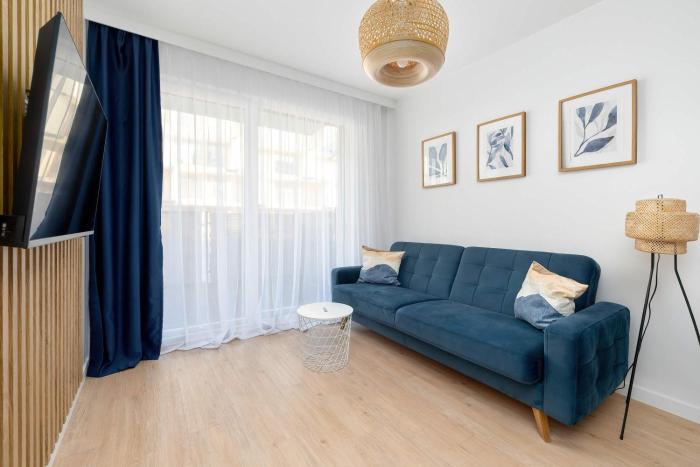 Cozy Apartment Located Near the Beach by Noclegi Renters