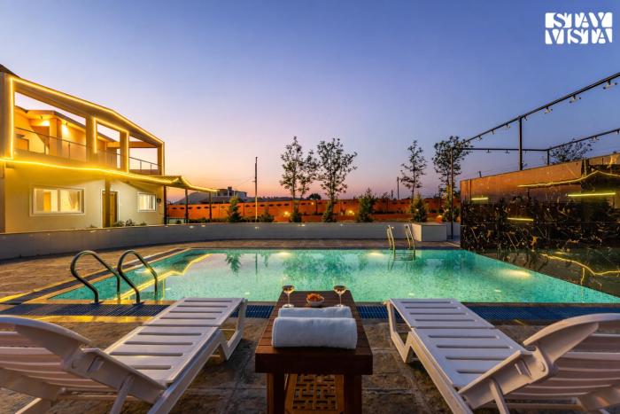 StayVista at Golden Petal with BBQ & Bonfire