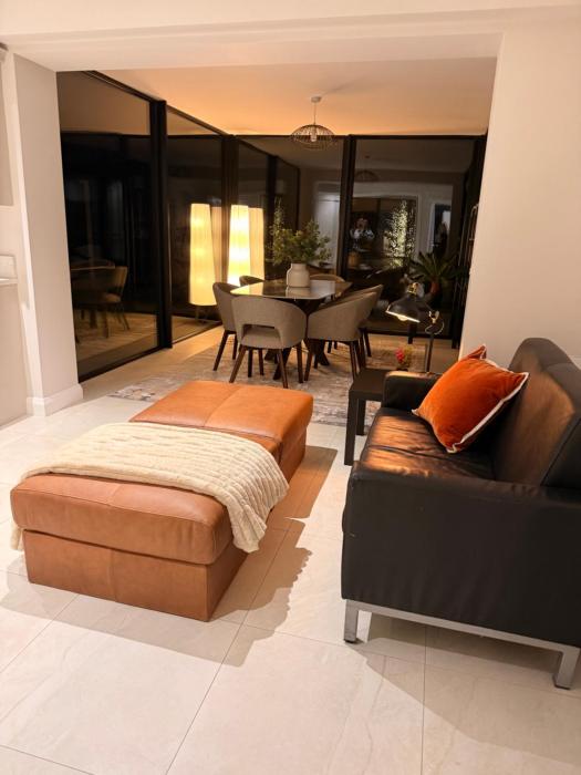 Modern Entire Home steps from the Train Station