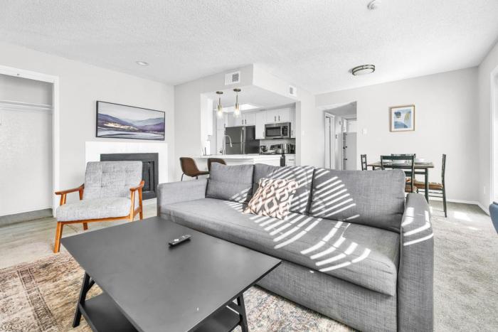 Modern 2BR Retreat with Pool Gym and WiFi