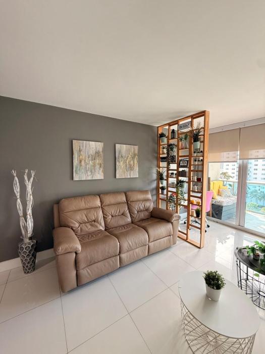 Modern 2BR beachfront with pool & tennis view