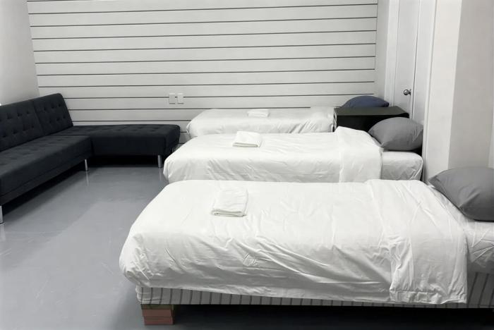 3 single beds, and 2 double sofa beds studio