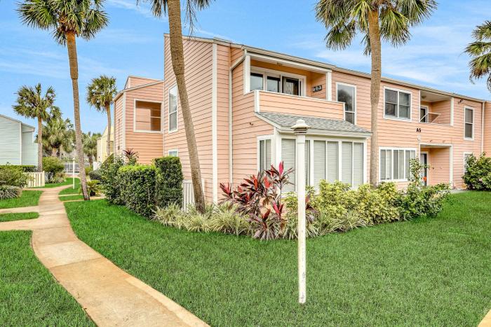 Oceanfront condo with pool, grill, central AC, washerdryer, & snowbird friendly